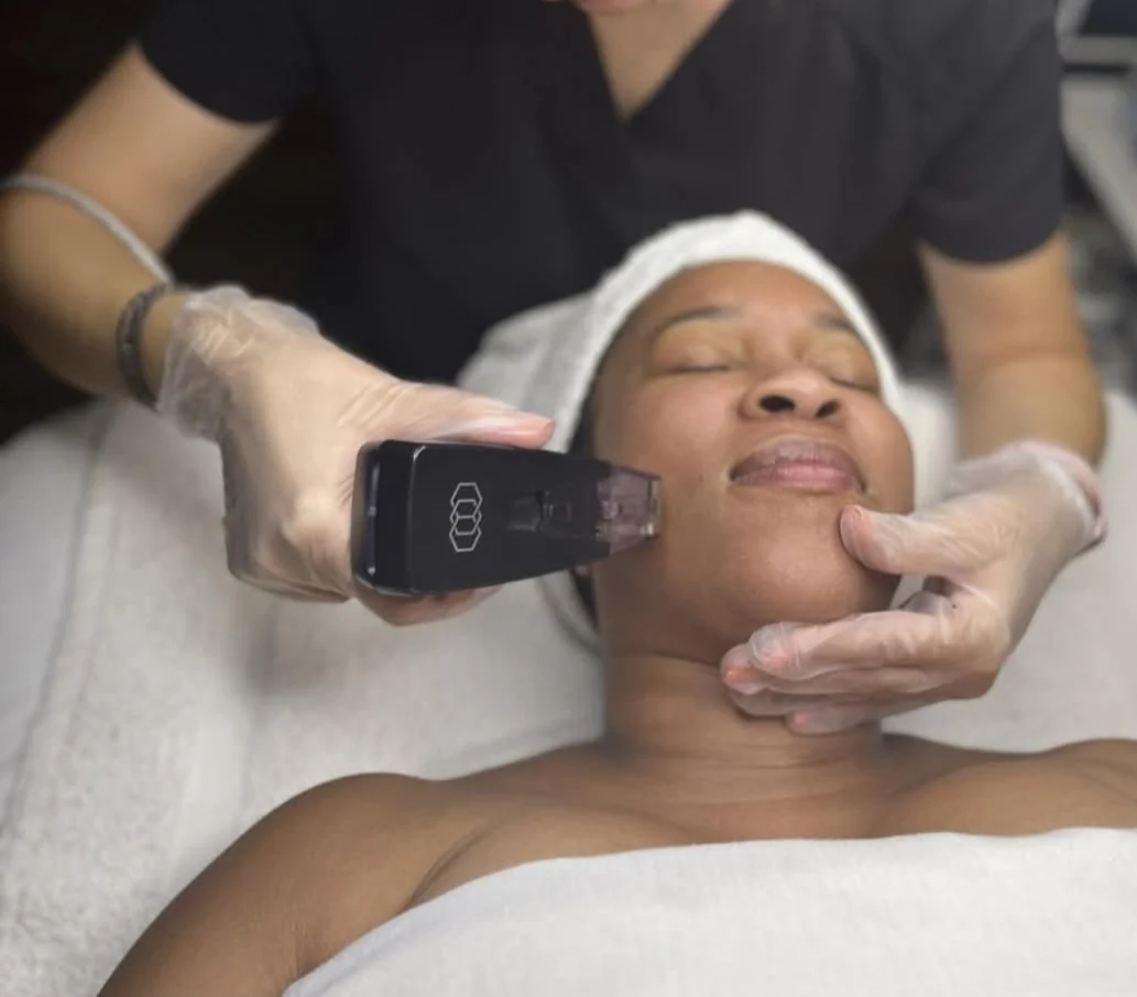 Professional facial treatment in progress at Victoria Edward Spa in Longwood, FL