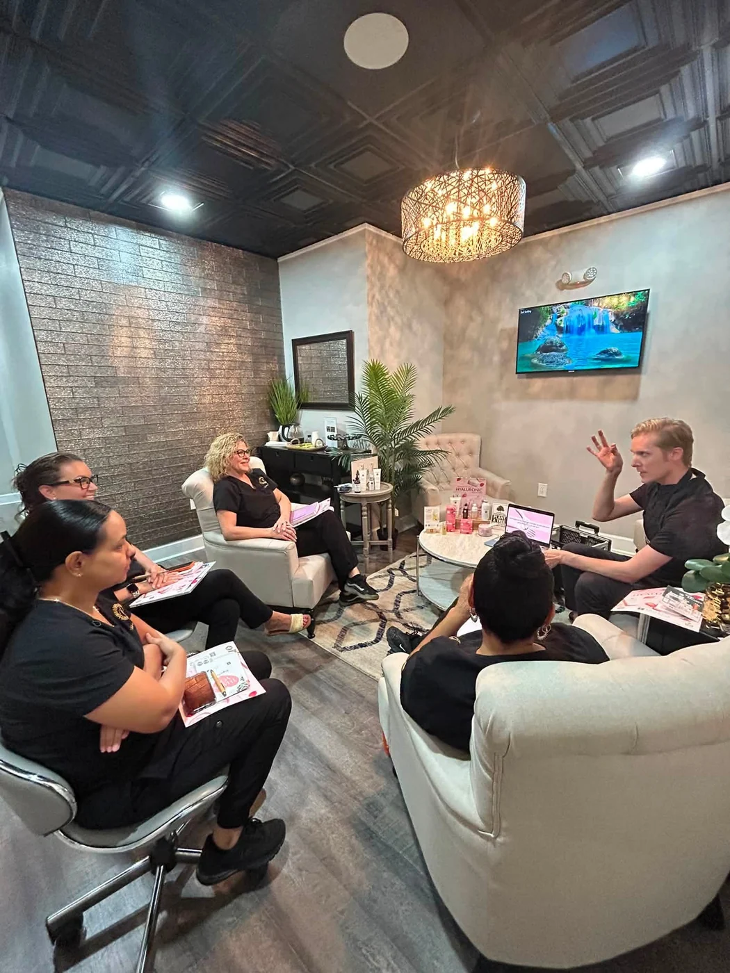 The Victoria Edward Spa team in a product and technique training session in Longwood, FL